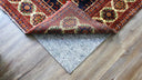 rug pad on hardwood floor