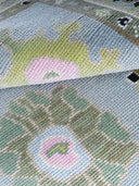 close up of hand knotted wool rug