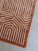 geometric pattern hand tufted wool rug corner