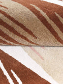 Close-up of a brown and beige patterned rug