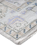 hand knotted wool rug corner