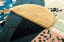 multicolored wall art rug close up