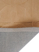 beige wool rug close up