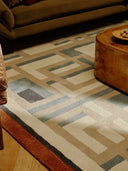 Geometric patterned rug in a living room setting