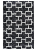 Black and white geometric-patterned handwoven rug