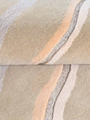 close up of a hand tufted wool rug