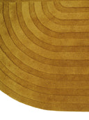 arch shaped tufted wool rug