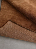 brown handloom rug close up