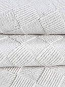 close up of a textured handloom wool rug