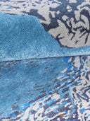 blue grey abstract wool rug close up