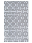 Gray and white geometric patterned rug
