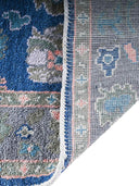 hand knotted wool rug back side view