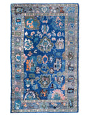 hand knotted wool rug in blue